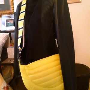 Crossbody puffer bag with multi designed shoulder straps by Think Royln